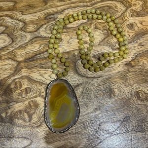 New yellow beaded long necklace. Huge yellow translucent marbled slab pendant.